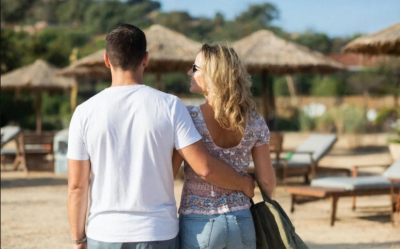 Young woman with shopping bags in a beautiful dress